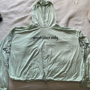 Mint Green cropped hoodie with butterflies, flowers, and good vibes only design